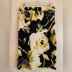 Yellow, white and black skirt.